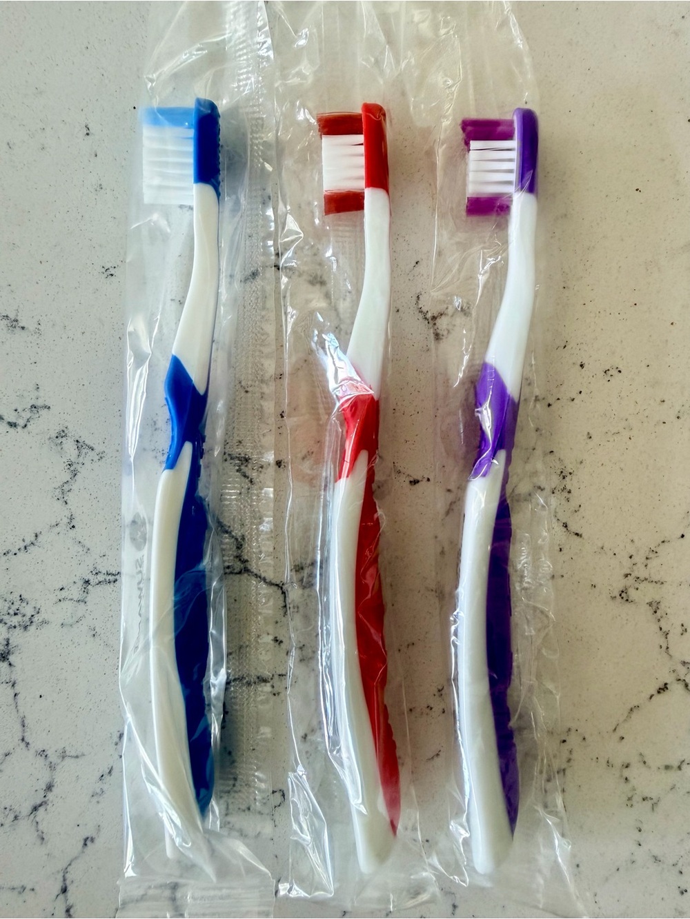 Disposable Blue, Red & Purple kids Toothbrush Trio - Home Party Supplies